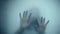 Female hand and head, spooky shadows on the glass wall, in full HD, Horror movie scene