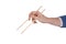 Female hand holding chopsticks