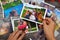 Female hand holding a photograph. Setting family photos. Watch family photo album.