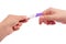 Female hand holding positive pregnancy test