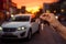 A female hand holds a car key, poised to start a new vehicle against a blurred car park backdrop