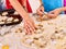 Female hand kneading dough