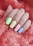 Female hand manicure color fur multicolor beauty