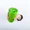 Female hand out of the hole in the paperman, keeps a green glass of coffee with him. Isolate on white background