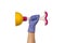 Female hand in a purple rubber glove holds a yellow plunger with