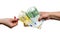 Female hand taking euro banknote from pile