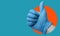Female hand with thumbs up gesture on a blue background, art collage. Positive hand sign
