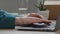 Female hands of caucasian busy business woman secretary manager user wear green jacket sleeve fingers typing on laptop