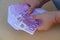 female hands close-up counting paper 500 euro banknotes, concept cash, payments, savings, banking, return money debt, car, win in