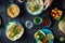 Female hands cooking vegetarian pita with variety dip