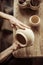 Female hands examining ceramic bowl at workshop