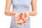 Female hands holding an AIDS ribbon