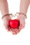 Female hands holding red heart