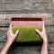 Female hands holds stack bath towels cotton