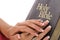 Female hands on holy bible