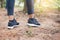 Female hands lacing running shoes. Closeup