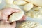 Female hands making biscuits and pie dough, close-up