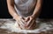 Female hands making dough. Hands kneading bread dough on a cutting board