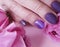 Female hands manicure purple delicate , passion fashion delight closeup decoration glamour background beauty elegance rose flower