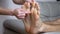 Female Hands Massage Bare Male Feet, Toes, Soles. Close up. Zoom