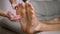 Female Hands Massage Bare Male Feet, Toes, Soles. Close up. Zoom