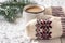 Female hands in mittens holding mug of hot chocolate