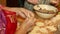 Female hands mold dumplings, close-up