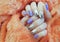 Female hands nails beautiful manicure delicate sweater,decoration fur