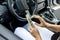 Female hands offer dolar bundle. Woman driver giving bribe