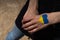 female hands painted in Ukraine flag colors in heart shape