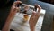 Female hands photographing coffee by smartphone