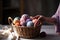 Female hands placing basket with colored balls of yarn. Art craft hand made concept.