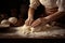 Female hands preparing dough on a wooden table