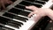 Female hands press piano keys. Piano playing. Close-up. Musical theme. Concert program.