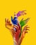 Female hands with rainbow colors over vivid yellow background. Human rights, freedom of choice, acceptance and support