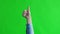 Female hands shows a thumbs up. Rruka gives a thumbs up. Like. The green screen is on.