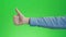 Female hands shows a thumbs up. Rruka gives a thumbs up. Like. The green screen is on.