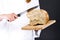 Female hands slicing home-made bread