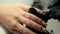 Female hands and tools for manicure, process of performing manicure