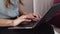 Female hands typing on laptop at remote office. Girl working on notebook.
