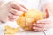 Female with heap of potato chips in big dish