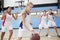 Female High School Basketball Team Dribbling Ball On Court