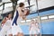 Female High School Basketball Team Passing Ball On Court