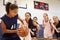 Female High School Basketball Team Playing Game