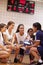 Female High School Volleyball Team Have Team Talk From Coach