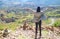 Female Hiker being Impressive with the Amazing Agricultural Terraces in Colca Canyon, Arequipa Region, Peru