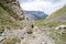 Female hiker descending from Lake `Ibon de Bernatuara`.