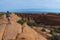 Female hiker on a Devils Garden trail to Double O Arch