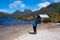 Female hiker enjoy the natural beauty of Mount Cradle and Dove Lake at Tasmania