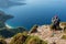 Female hiker making photo of the beautiful seascape near Antalya, Turkey